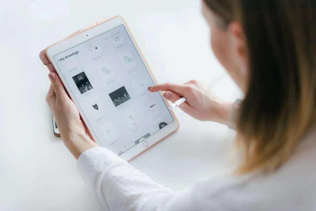 woman looking at things on ipad